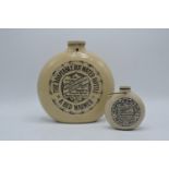 A pair of The Adaptable Hot Water Bottle & Bed Warmer made at Old Fulham Pottery. In good condition,