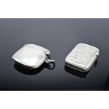 A pair of Silver vesta cases, hallmarked for Birmingham 1899 and Birmingham 1910. 41.6 grams total