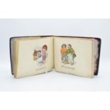 1920s album containing charming watercolours, sketches, various prints and writing (half the pages