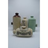 A collection of stoneware foot warmers to include 2 Doulton (4) The stoneware's condition is as