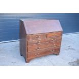 Late Victorian/ Edwardian oak bureau. In good functional condition with some attention needed.