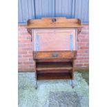 Edwardian Arts and Crafts light oak student desk. Very classic of its period. In good functional