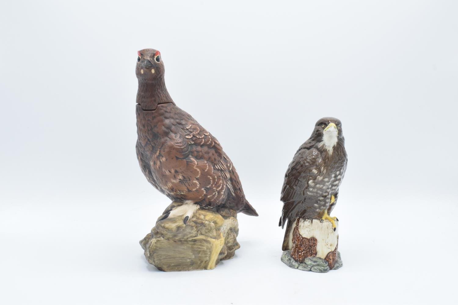 Royal Doulton buzzard whiskey decanter and The Famous Grouse decanter (2) In good condition