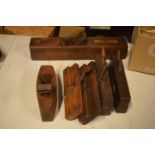 A collection of early 20th century wood working planes, in mixed condition, some incomplete.