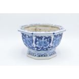 Early 20th century blue and white Chinese planter with a pierced base. In good condition with some