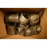A collection of 18th and 19th century pewter including tankards, tea pots etc