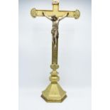 Early 20th century cast brass church crucifix with a figure of Jesus, marked 'INRI', possibly