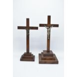 French 20th century crucifixes on wooden crosses. In good condition. 37cm tallest
