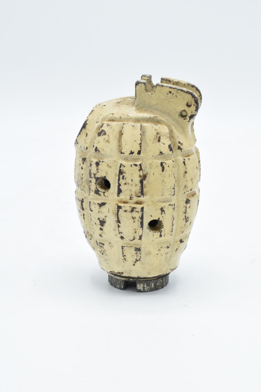 Mid-late 20th century Mills bomb Number 36 hand grenade, inept and FFE. The grenade has been drilled