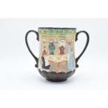 Royal Doulton loving cup Pottery in the Past D6696. In good condition with no obvious damage or