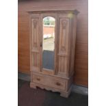 Edwardian pine mirror fronted wardrobe. Top cornice section in need of attention. Otherwise a good