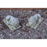 Reconstituted stone models of sleeping lions . Made in England, these items are frost and weather