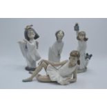 Lladro figures girl kissing 4873, Geisha playing the flute 6150 and Nao ballerina and girl with