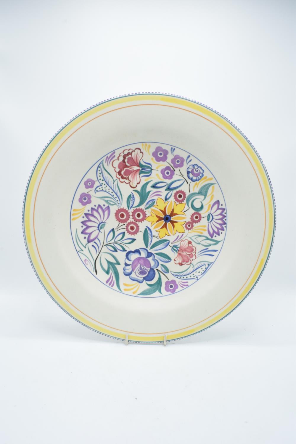 Large Poole Pottery floral charger, 39cm diameter. In good condition with no obvious damage or