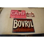 A collection of metal advertising signs including Bovril and 2 Camp (3) Rust and wear to the pink