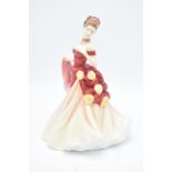 Royal Doulton figure Autumn Ball HN5465. In good condition with no obvious damage or restoration.
