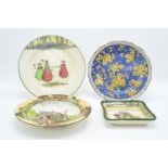 A collection of Royal Doulton seriesware including a motoring scene dish and 3 other examples.