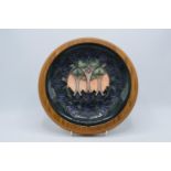 Large Moorcroft plate with a woodland design in a wooden wall mount, marked as seconds. Small firing