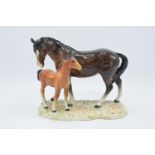 Beswick mare and foal ona cermaic plinth 953. In good condition with no obvious damage or