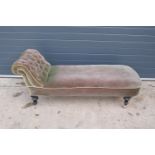 Late Victorian upholstered chaise long filled with horse hairs on casters (one missing). Small rip