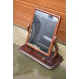 A late Victorian dressing table swinging mirror.