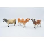 Beswick cows to include a Jersey, Guernsey and an Ayrshire (3). All a/f. Jersey horns broken.