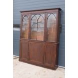 large Victorian estate-made bookcase with adjustable shelves and arched doors. A great item which is