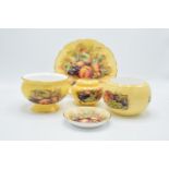 A collection of Aynsley Orchard Gold items to include a plate, dish, lidded pot and 2 sweet