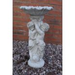 Reconstituted stone birdbath depicting children. 65cm tall. Made in England, these items are frost