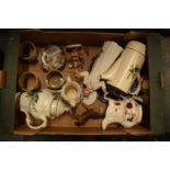 A mixed collection of items to include a Doulton Pope figure (af), tea pots, stoneware etc.