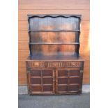 1930s oak dresser and rack. No back to it. Doors don't stay shut. 124 x 47 x 178cm.