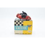 Boxed Scaletric Typhoon B1 red motorbike and sidecar. Untested but displays well. One head loose.