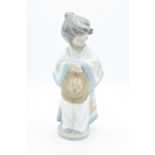 Nao by Lladro unusual figure of a child with a Pancho. In good condition with no obvious damage or