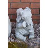 Reconstituted stone model of an elephant. 32cm tall. Made in England, these items are frost and