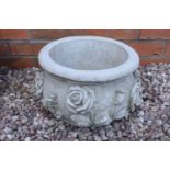 Reconstituted stone small rose planter. Made in England, these items are frost and weather proof.