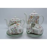 A collection of Minton Haddon Hall items to include tea and coffee pots, 6 cups and saucers and a
