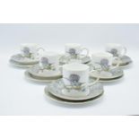 A collection of Wedgwood china trios in the Humming Birds design (18 pieces). In good condition with