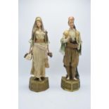 A pair of large Turn Wien (Vienna) figures by Ernst Wahliss, circa 1900. Both are in good