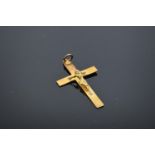 9ct gold crucifix pendant with full hallmarks, 0.9 grams