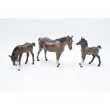 Beswick grazing foal 946, medium foal 1084 and brown mare 1991 (3). In good condition with no
