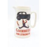Guinness pub advertising jug 'Guinness for Strength'. In good condition with no obvious damage or