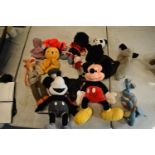 A collection of cuddly toys to include Dennis the Menace, Star Wars, Mickey Mouse etc.