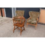 A pair of Parker Knoll winged back chairs together with a reproduction captains chair. 95cm tall. As