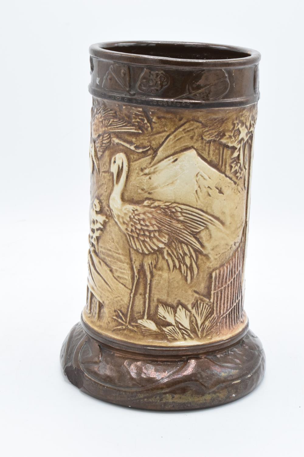 Bretby Pottery large vase in a brown glaze with oriental scenes. Generally it is in alright