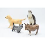 A collection of Beswick to include a donkey, a large golden retriever together with a Royal
