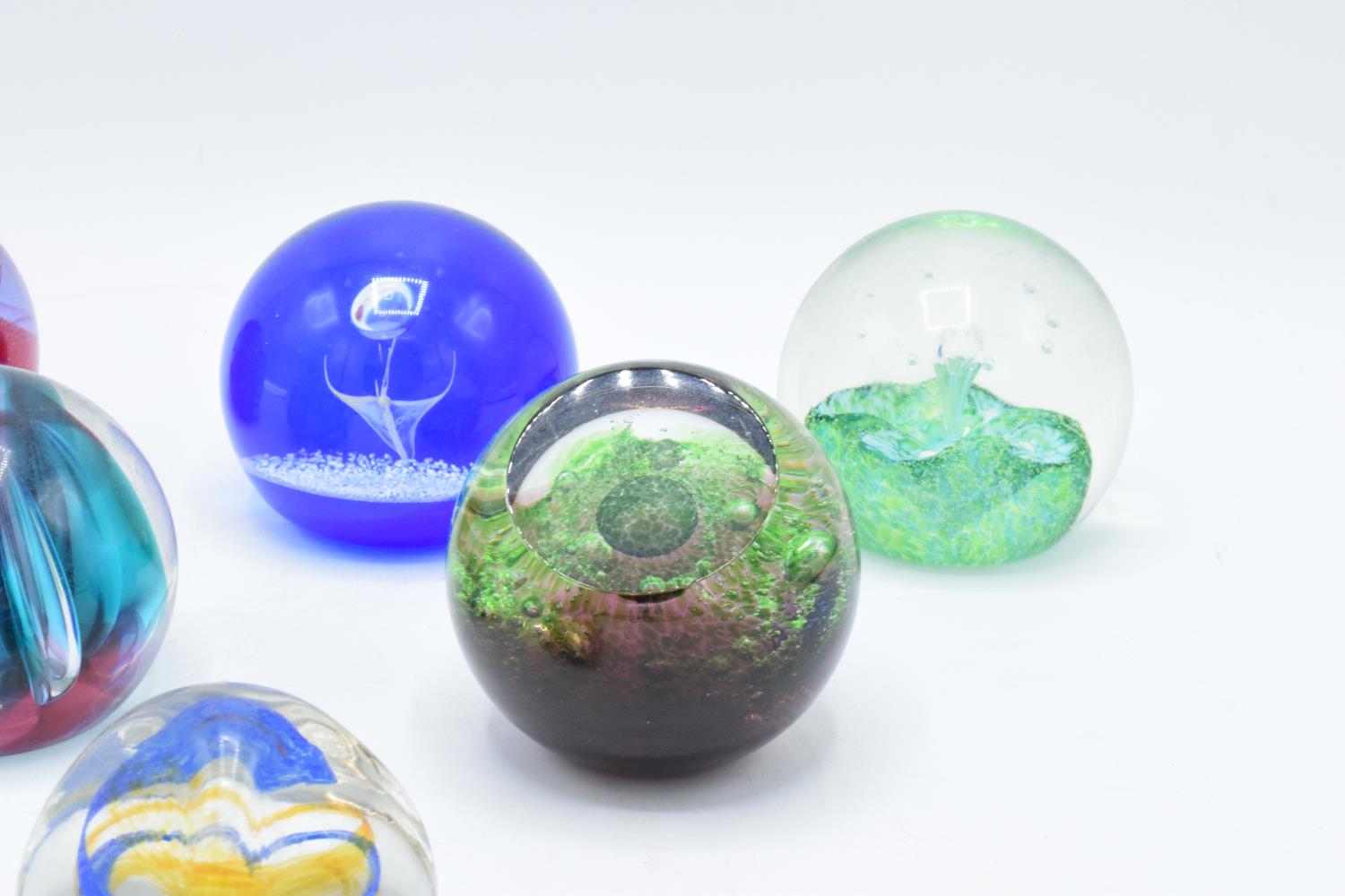 A collection of Caithness glass paperweights to include Pebble, Scimitar, Nebula, Moonlight - Image 2 of 5