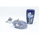 A collection of Royal Copenhagen to include a sleeping cat 057, a bird 107 and a floral vase 1590/