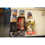 A good collection of Star Wars toys to include Jar Jar Binks, interactive Yoda, Dark Vador from