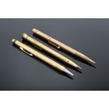 A collection of gold plated propelling pencils to include makers such as Eversharp x 2 and Maxim.