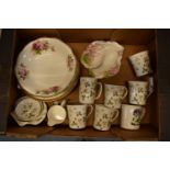 A mixed collection of pottery include Wedgwood Wild Strawberry, Royal Doulton Royal Gold plates,